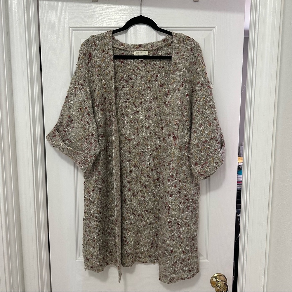 gray and pink speckled knit cardigan